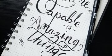 pen on you're capable of amazing things spiral notebook